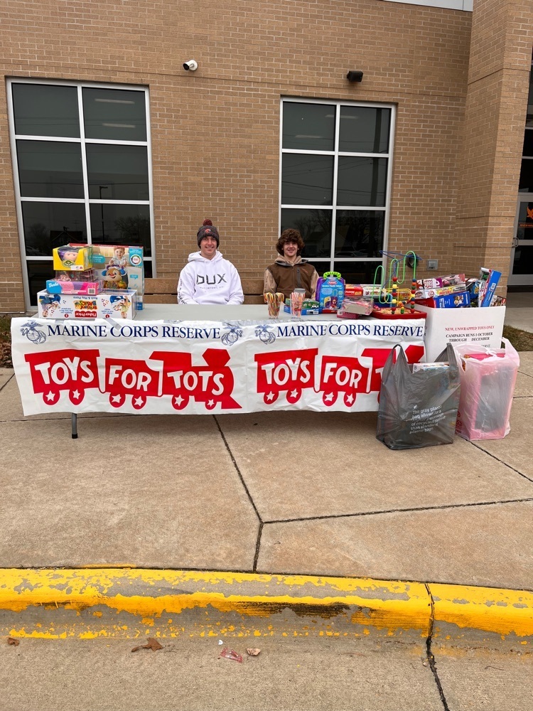 Carson and Kyler collecting donations for Toys for Tots